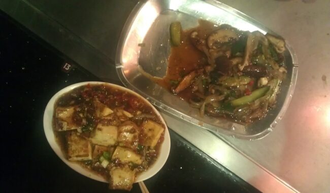 Vegetarian teppanyaki set meal with mushrooms and tofu grilled at an at-home hibachi party Vegetarian teppanyaki set meal with mushrooms and tofu grilled at an at-home hibachi party