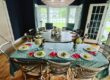 Dining room table set with plates and glassware for a family dinner, from the Hibachi Royal gallery