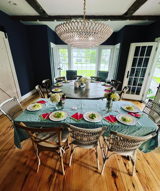 Dining room table set with plates and glassware for a family dinner, from the Hibachi Royal gallery